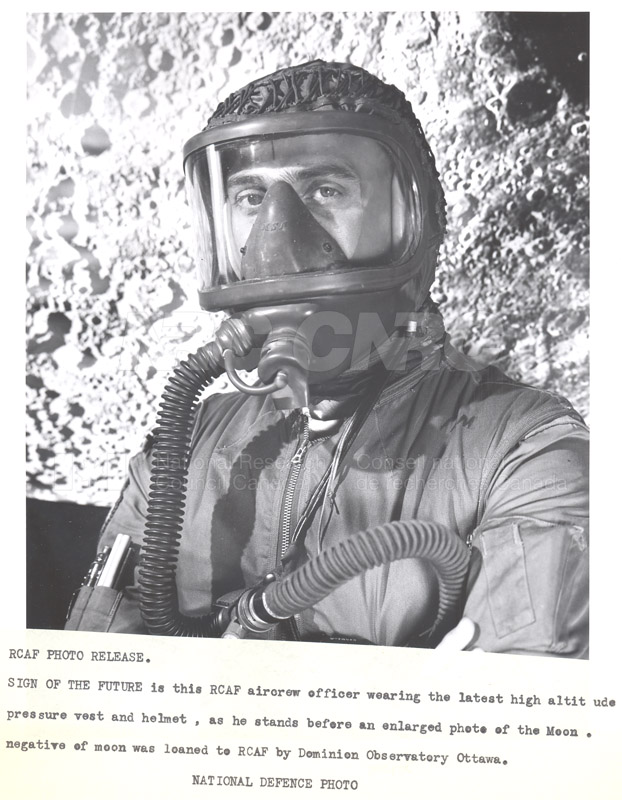 R.C.A.F. Aircrew Officer Wearing the Latest High Altitude Pressure Vest and Helmet