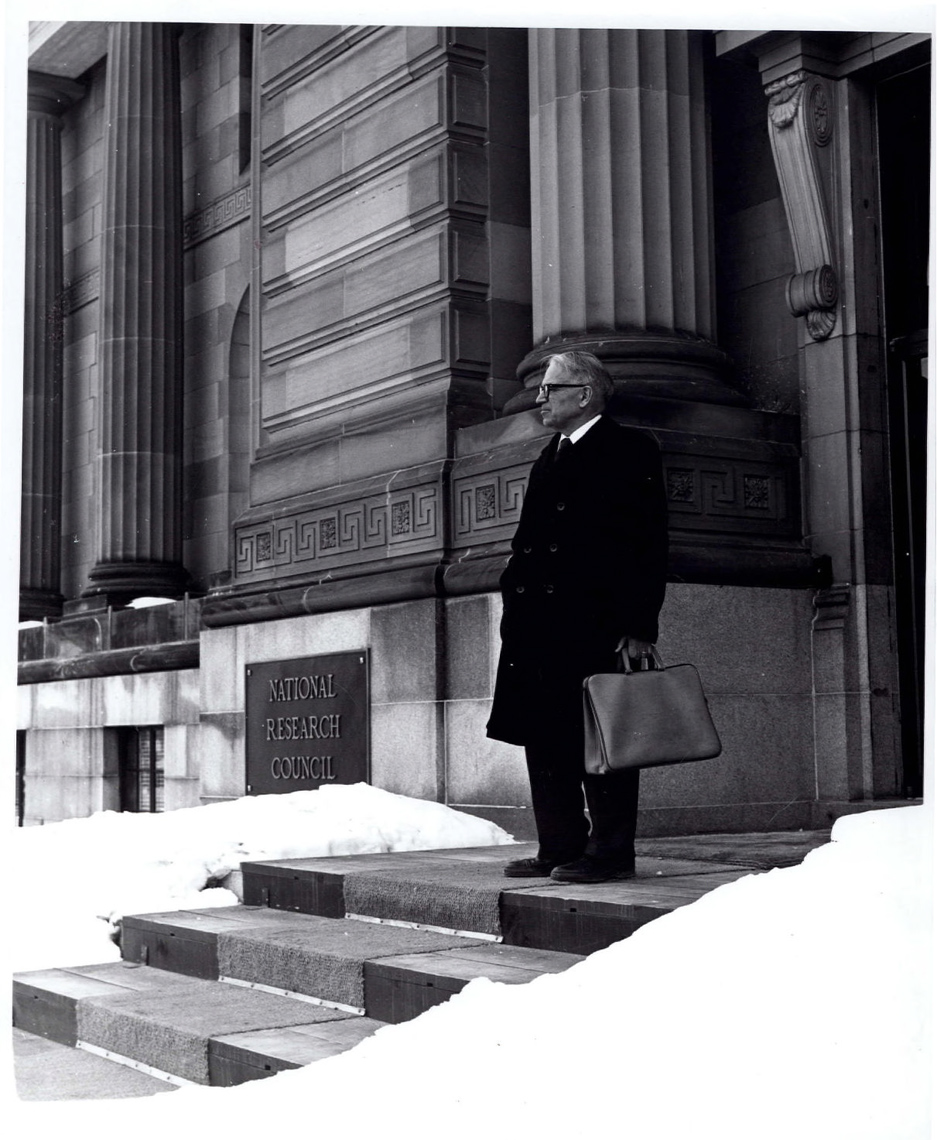 Tab 1: Gerhard Herzberg on steps of NRC, 100 Sussex Drive, February 1985, photo 2